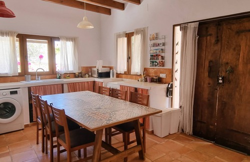 Beniarbeig Casa | Peaceful and relaxing rustic house with a spacious garden surrounded by trees.