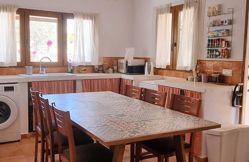 Beniarbeig Casa | Peaceful and relaxing rustic house with a spacious garden surrounded by trees.