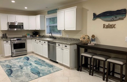 Singer Island Casa | NUEVO listado: capacidad para 8 personas, pasos a la playa de Singer Island.