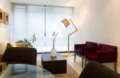 Distrito Financiero Apartamento | UBICACIÓN PERFECTA 1BDR 1. 5BTH WI FI, NETFLIX, PISCINA, GIMNASIO, SAUNA, SEGURIDAD LAS 24 HORAS.