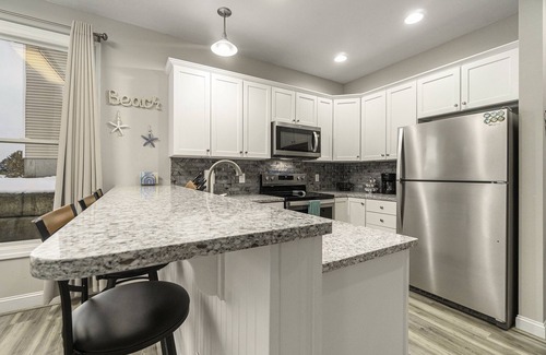 Manistee Condominio | Pet Friendly Customized Harbor Village Condo