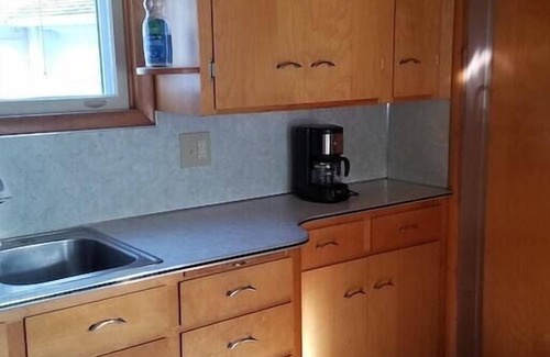 Manistee Casa | Casa que admite mascotas cerca de todo.