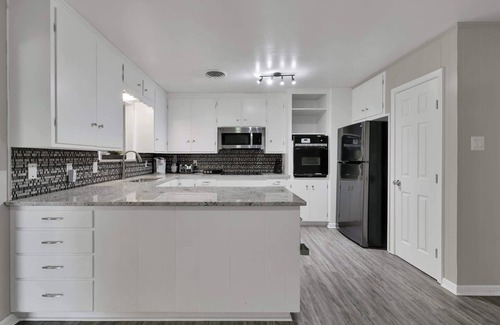 Huntsville Casa | Retiro de Piney Woods | Mesa de ping pong | Por Sam Houston State University