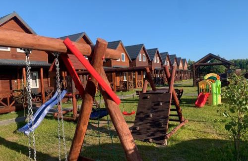 Wicie Complejo | Pod Dębami Wicie- domki drewniane nad morzem