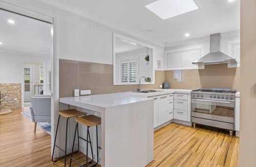 Bateau Bay Casa | Poets Corner Retreat- Indoor Fireplace