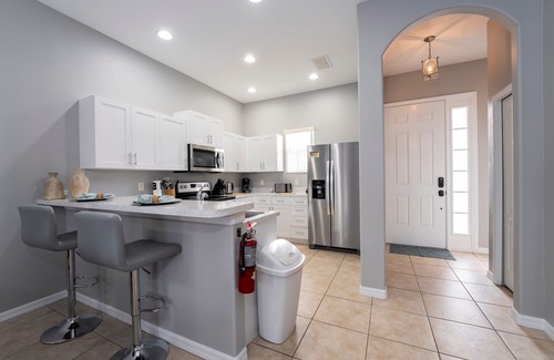 Lake Davenport Estates Casa | Villa de 4 dormitorios, 3. 5 baños, patio con piscina, sala de juegos y casa club en el lugar