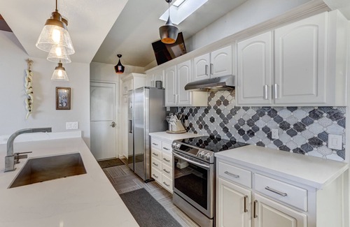 Fountain Hills Casa | POOL & SPA! Football fans will love the TV Wall! Remodeled mid-century luxury!