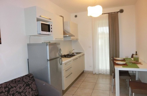 Bibione Lido del Sole Apartamento | Vistas junto a la piscina desde un cómodo apartamento