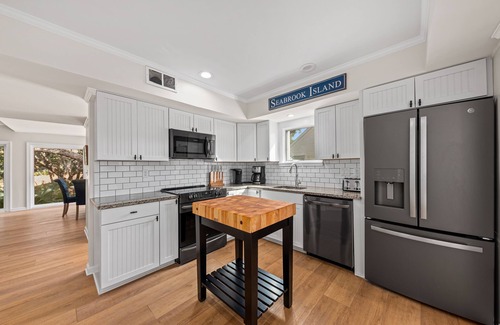 Spinnaker Beachhouses Casa | ¡Popular Spinnaker Beach House! Cerca de la playa con vistas al campo de golf. ¡Mascota amigable!