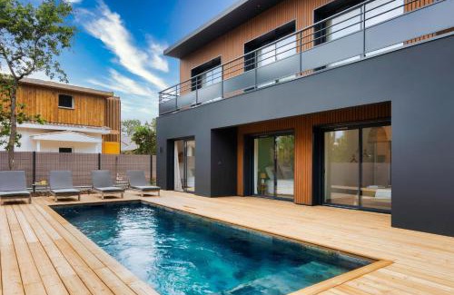 Lacanau-Ocean Villa | Prestigious Sunset 1&2 Villas 2 heated swimming pools sea view16 pers