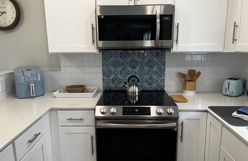 Manistee Casa | Private Hot Tub, Outdoor TV, near Downtown & Lake Michigan Beaches!