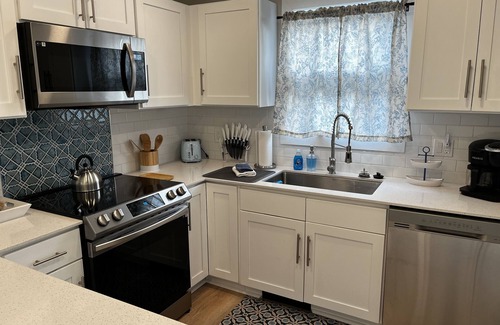 Manistee Casa | Private Hot Tub, Outdoor TV, near Downtown & Lake Michigan Beaches!