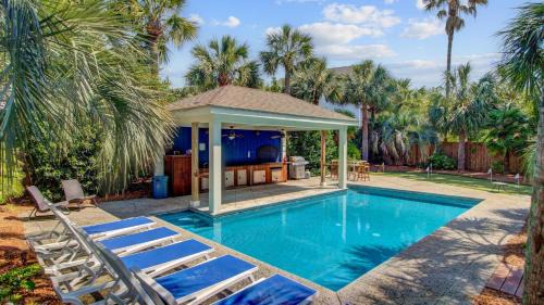 Isle of Palms Casa | Private Pool Putting Green Steps to Isle of Palms Beach Paradise on Palm
