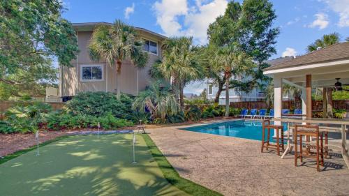 Isle of Palms Casa | Private Pool Putting Green Steps to Isle of Palms Beach Paradise on Palm