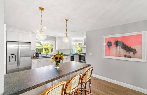 Lake Ida Shores Casa | Diseñador renovado paraíso tropical en el lago Ida Delray Beach W / piscina climatizada