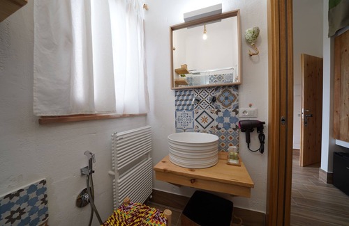 Pulsano Cama Y Desayuno | Pumo room symbolizing fertility, abundance and prosperity