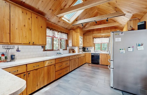 Meredith Casa | Quintessential lakefront home with woodstove, beach access, dock & washer/dryer