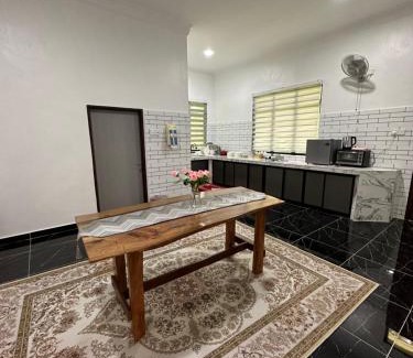 Kuala Berang Casa | Rania Riverview Guesthouse #BestGuesthouseInTown #SpaciousLivingRoom #ModernClassicConcept #LuxuryDiningset #freeWifi #Netflix #FullyAircond #CozyPrayerSpace