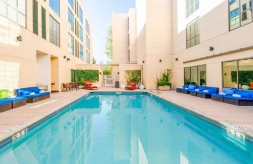 Cupertino Casa | Redefining travel with weekly live music & poolside yoga!