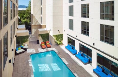 Cupertino Casa | Redefining travel with weekly live music & poolside yoga!