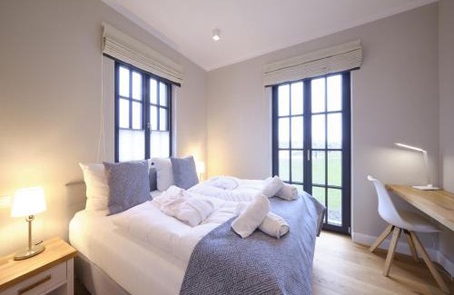 Dranske Casa | Reetland am Meer - LuxusPlus Reetdachvilla mit 4 Schlafzimmern und Kamin G09