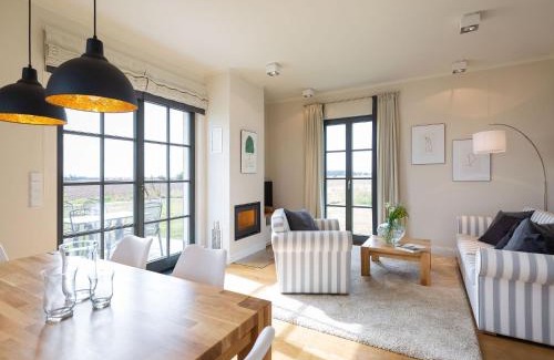 Kreptitz Casa | Reetland am Meer - Premium Reetdachvilla mit 2 Schlafzimmern, Sauna und Kamin E11