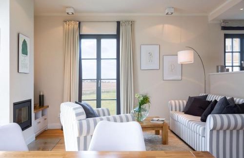 Kreptitz Casa | Reetland am Meer - Premium Reetdachvilla mit 2 Schlafzimmern, Sauna und Kamin E11