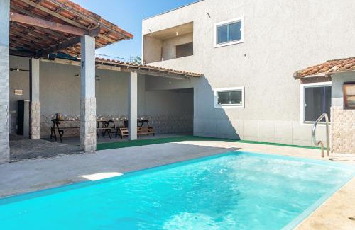Cabo Frio Casa | Refúgio Tropical Casa de Praia com Piscina Climatizada e 4 Suítes e garagem 3 carros, 800 mtrs da praia internet 700 mbps, condomínio privado com pista de skate , quadra de futevôlei , campos e quadras de futebol!