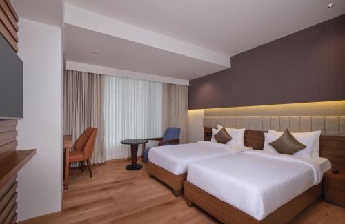 Thaltej Hotel | Regenta Place Ahmedabad