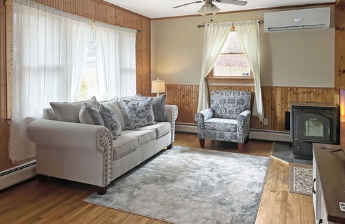 Stamford Casa | Relax by our scenic brook and enjoy the view of the Green Mountains!