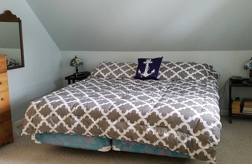 Indian River Cabaña | Relájese En Hermosa Burt Lake. Durante todo el año Comfort en este lago adelantado Chalet.