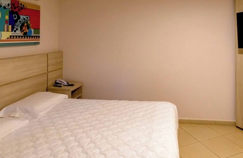 Foz do Iguacu Hotel | Relax Together | A Cozy Couples' Room Where Trendy Meets Comfort