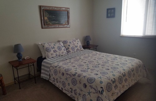 Sunset Beach Casa | Relajante frente al lago, cerca de la playa, para familias, barrio tranquilo.