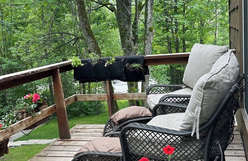 Georgian Bay Cabaña | Renovated water front cottage w/firepit, multi level decks & screened in porch.