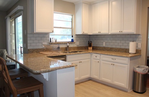 Orlando Casa | Resort Like Waterfront 4/2 Pool Home Retreat en el este de Orlando, Florida