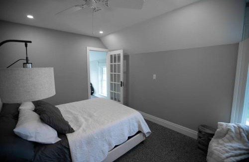 Maquoketa Casa | Restored Queen Anne Cottage