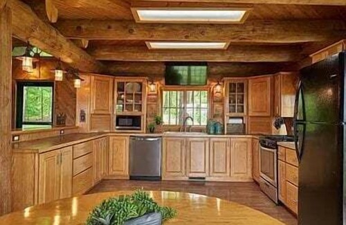 Newaygo Cabina | Relax at River's Edge: Stunning Views, Hot Tub, Pet-Friendly!