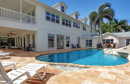Tropic Casa | Riverfront Family Pool/Spa Game Rm 8bd/5.5ba 20ppl