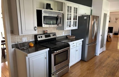 Menasha Casa | Riverfront Oasis - Hot tub- Seasonal heated pool