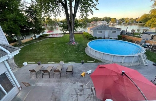 Menasha Casa | Riverfront Oasis - Hot tub- Seasonal heated pool