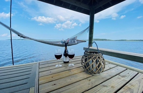 Hobucken Casa | Riverfront property with dock and ramp. Dolphins, fish, boat, swim & more