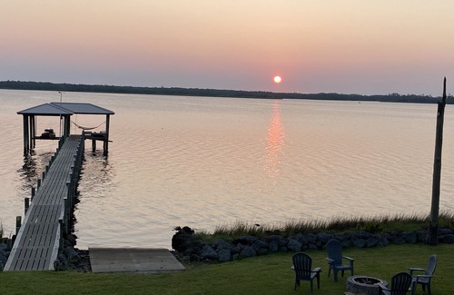 Hobucken Casa | Riverfront property with dock and ramp. Dolphins, fish, boat, swim & more