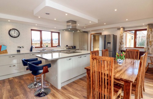 Old Cleeve Cabaña | RIVERSIDE LODGE, pet friendly, character holiday cottage in Washford