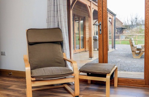 Old Cleeve Cabaña | RIVERSIDE LODGE, pet friendly, character holiday cottage in Washford