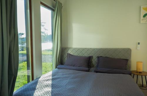 Jurmala Casa | RiverView Cozy Cabins in Jurmala with fishing opportunity