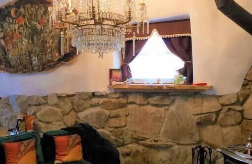 Cerrillos Casa | Romantic, Rock Carriage House, Hot Tub, Woodstove, Kitchen on Historic Property