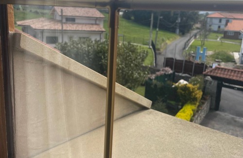 Marina de Cudeyo Apartamento | Habitación 'Dalia' con vistas a la montaña, terraza compartida y Wi-Fi