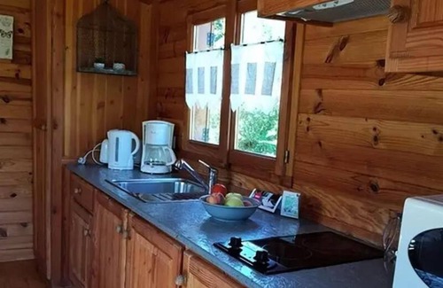 Saint-Paulien Cabina | Camping La Rochelambert **** - Roulotte du Velay Confort 2 habitaciones 4 personas