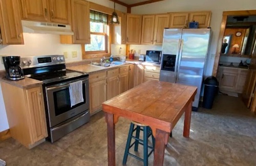 Opheim Cabina | Rustic and Secluded 1 Bedroom Cabin Retreat. Located on Private Stocked Pond.