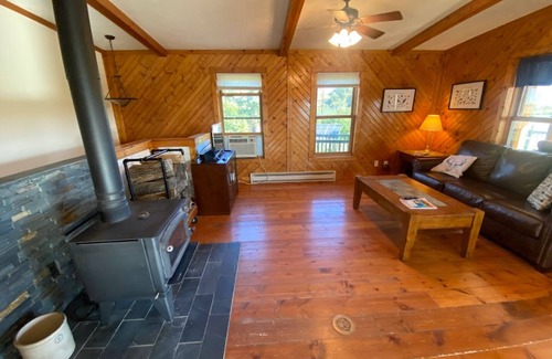 Opheim Cabina | Rustic and Secluded 1 Bedroom Cabin Retreat. Located on Private Stocked Pond.